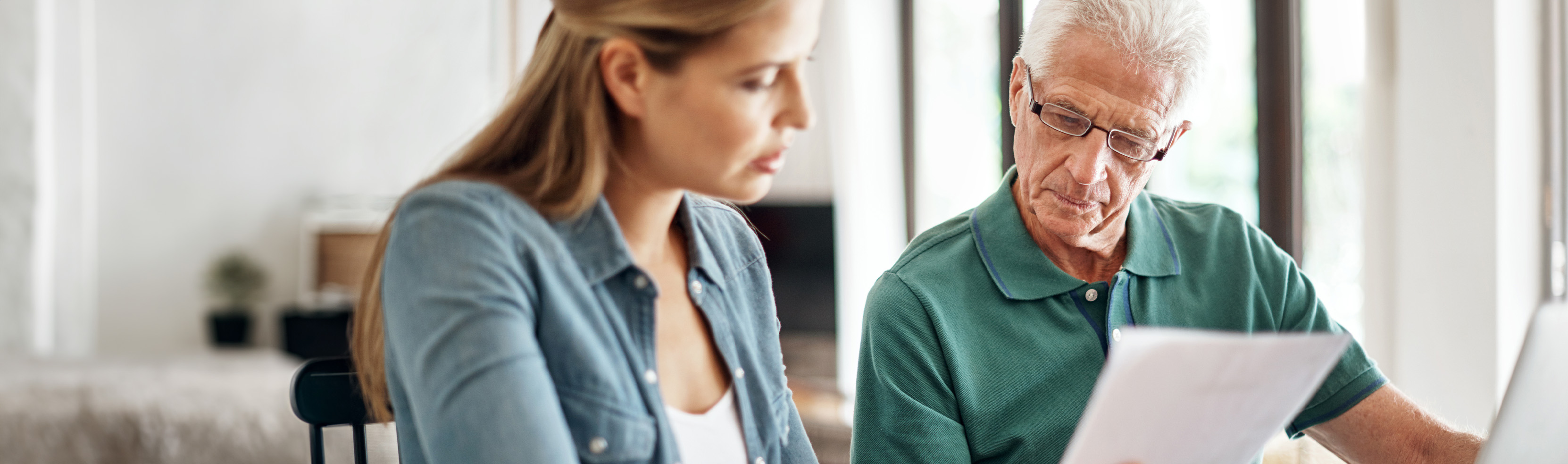 Man and woman looking at documents