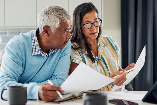 Man and woman looking at paperwork