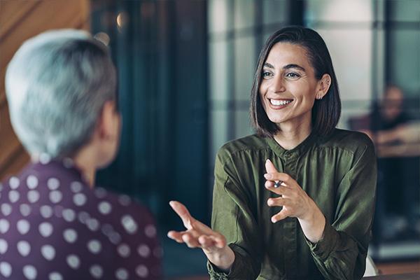 Two women talking